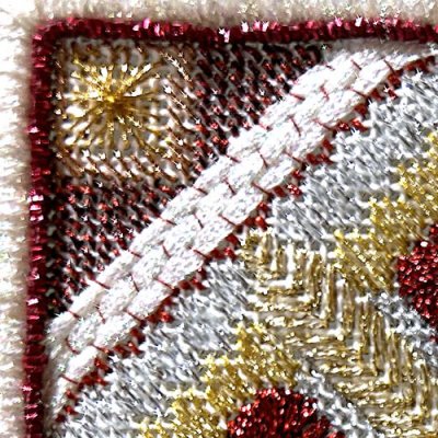White Kreinik Ribbon couched with red Cord