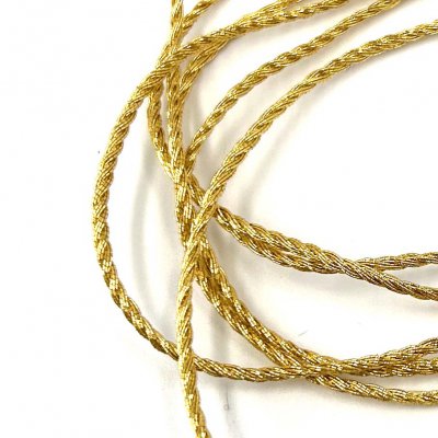 Gold Torsade is a costume designer's dream