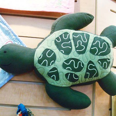 Use iron-on ribbon around applique