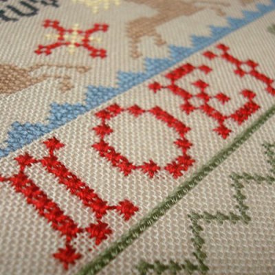 Stitched with Kreinik threads