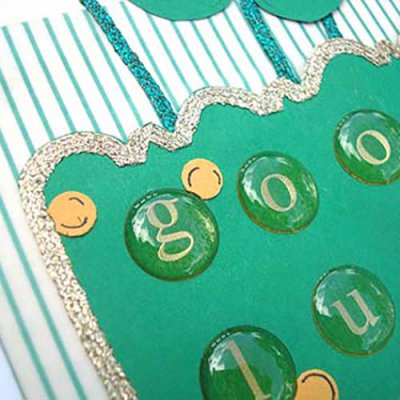 Use iron-on ribbon for a metallic border on cards and papercrafts