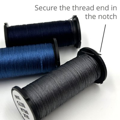Secure the thread end in the notch