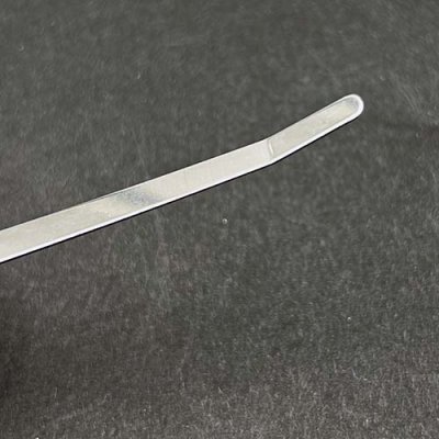 The bodkin has a bent tip