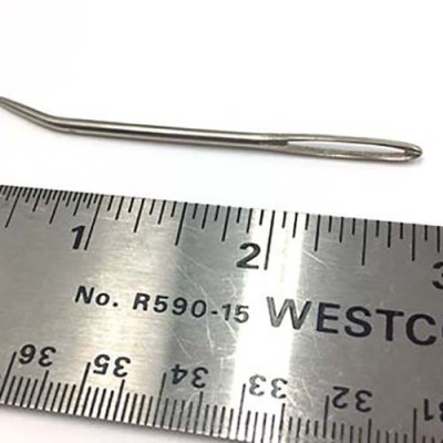 A bent weaver's needle is used for both weaving and embroidery