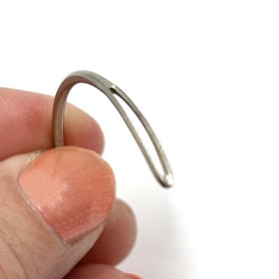 A curved, blunt-point needleA long, blunt-point needle with a large eye