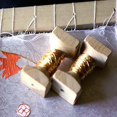 Komas hold thread you are couching