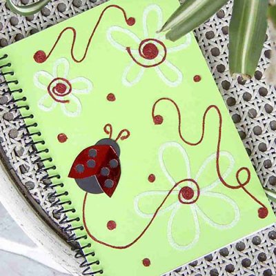 Made with Kreinik Iron-on ThreadLadybug Notebook Closeup