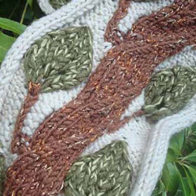 Ombre adds a variegated look to the brown area in this knitted design