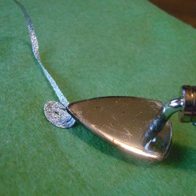 Make paw prints with iron-on thread