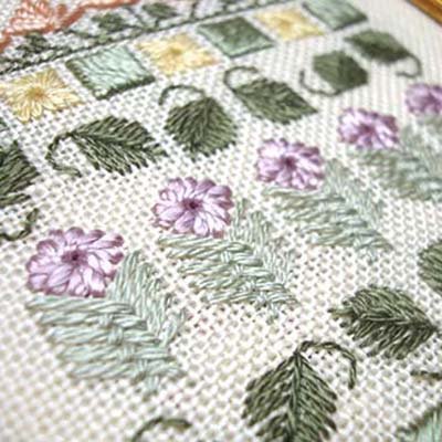 Silk Serica is idea in specialty stitches like the purple flower
