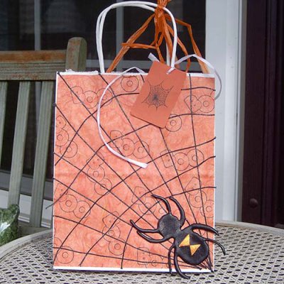 Black iron-on ribbon makes a cool spider web