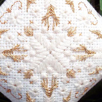 Kreinik silk and metallic threads make a classic holiday ornament