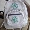 Personalize a store-bought item with iron-on threads